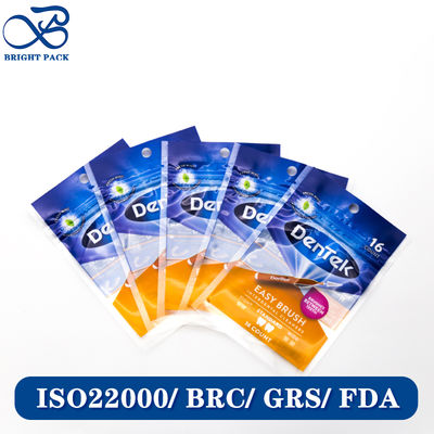 Bolsa de sellado de tres lados de calibre fino para envasado de hilo dental con impresión de marca personalizada y diseño de orificio para colgar.