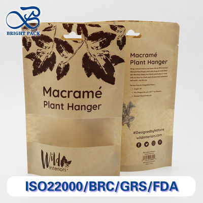 Bolsas de papel Kraft reciclables y degradables con ventanas transparentes para productos diarios.