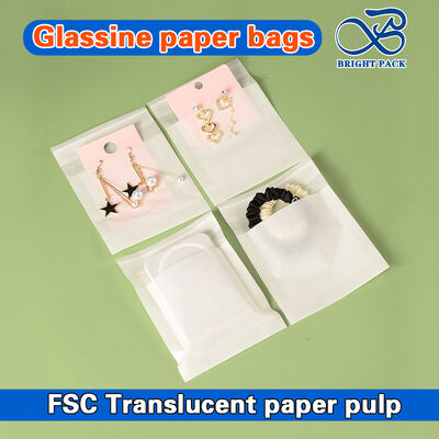 Bolsas personalizables de papel glassine translúcido biodegradable para empaques ecológicos de ropa